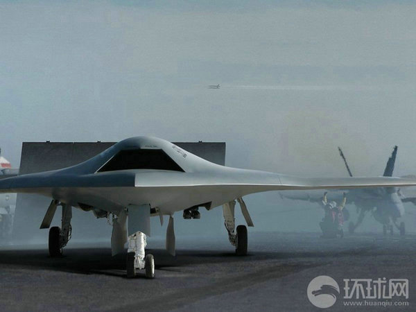 資料圖：X-47B無(wú)人機(jī)在航母上起降想象圖。